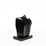 Black stone sculpture by Tom Ashbourne